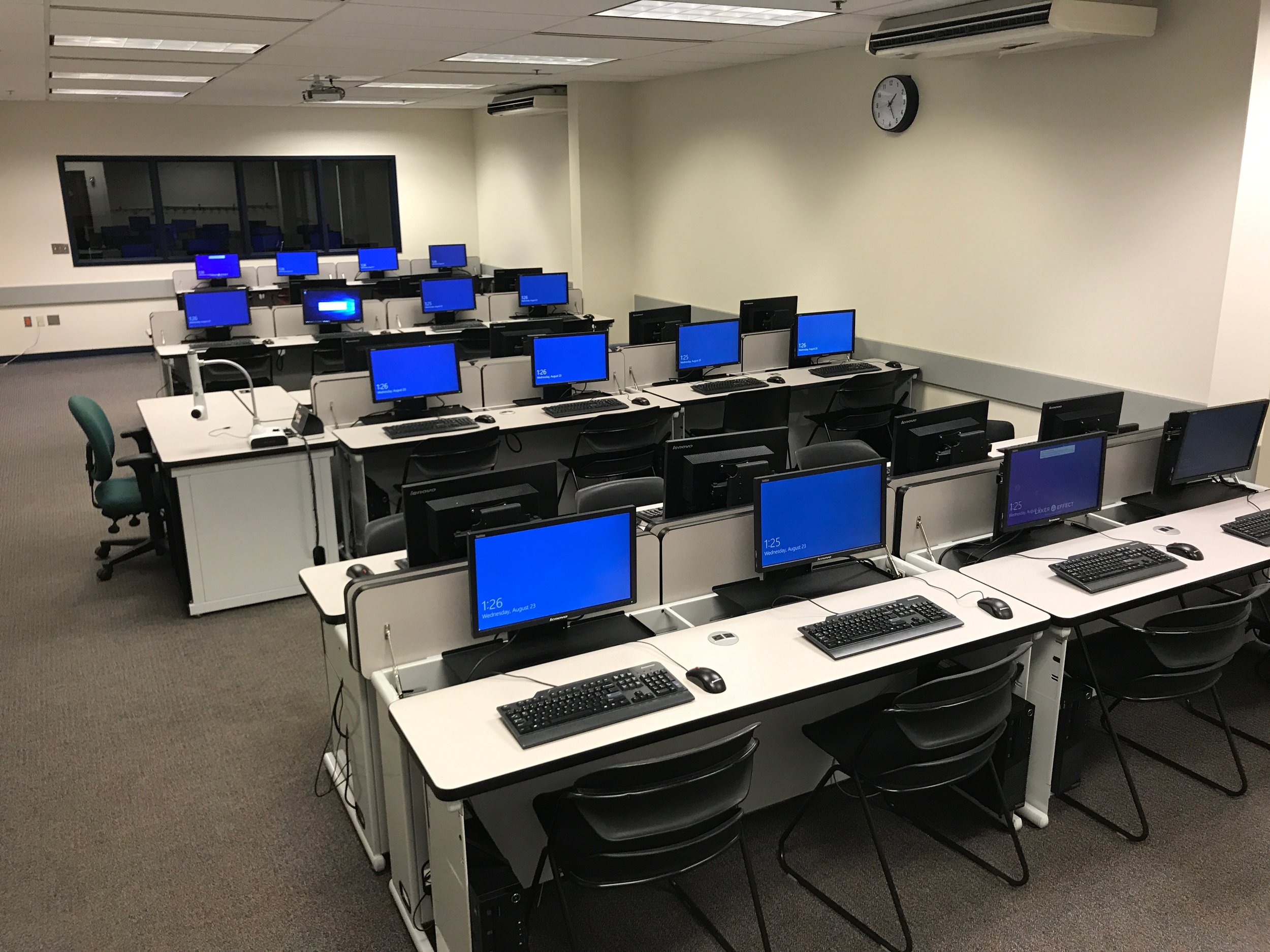 Computer Comforts Hide-Away LCD Tables at Grand Valley State University