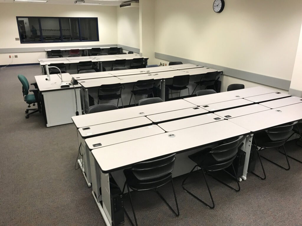 Furniture installation at Grand Valley State University featuring the Hide-Away IT Lectern, RACK2 Fixed CPU Holder, Hide-Away LCD Table and Node.