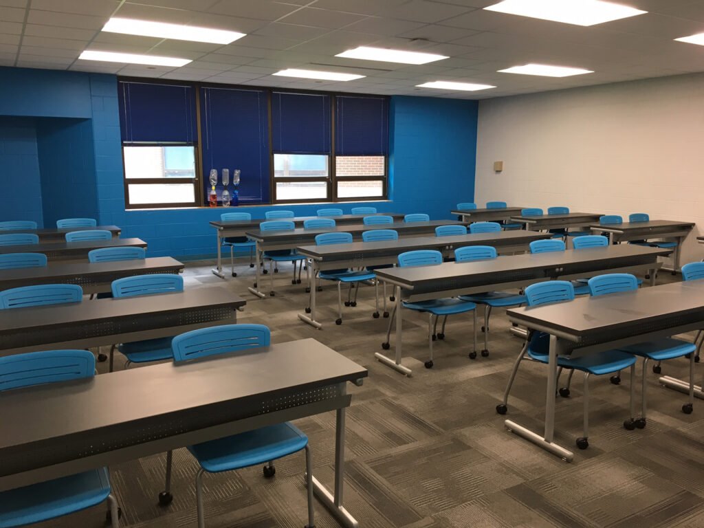 Furniture installation at Jacksonville State University featuring the OM5 Active Guest Chair and Power Lift Lectern.