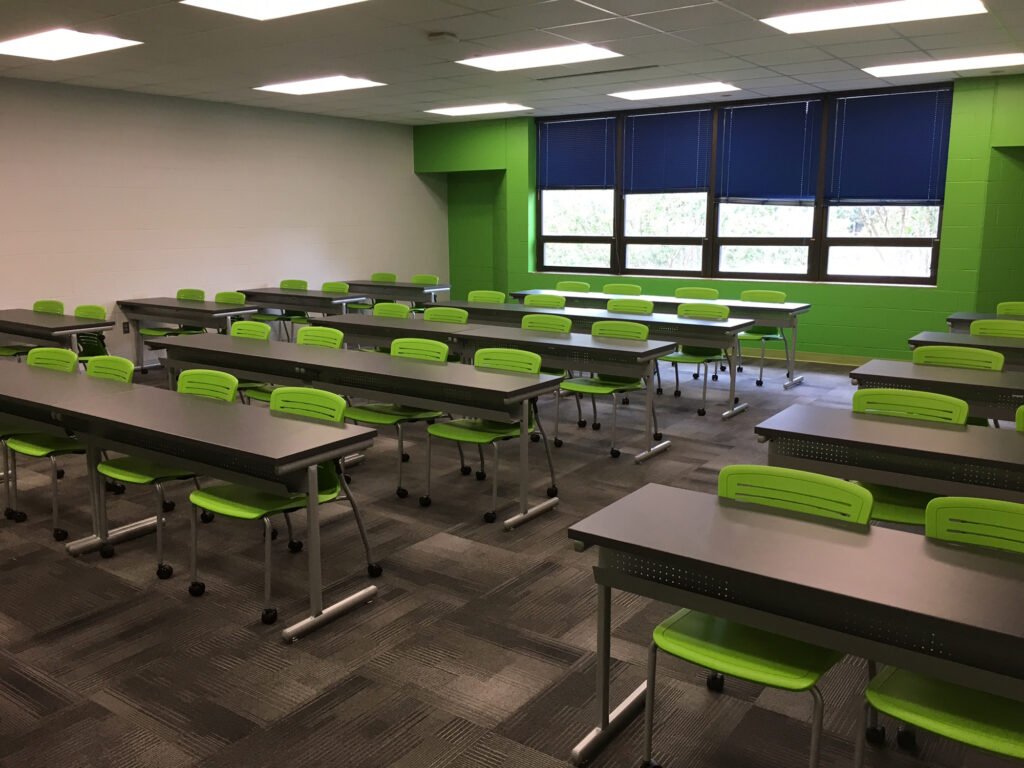 Furniture installation at Jacksonville State University featuring the OM5 Active Guest Chair and Power Lift Lectern.