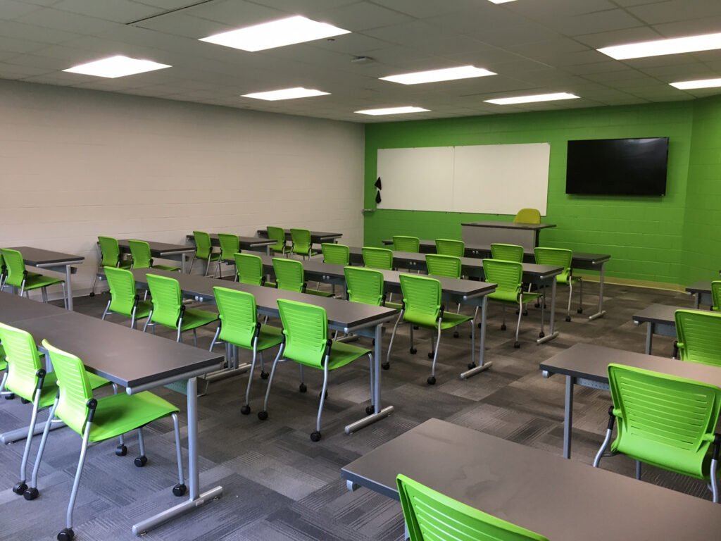 Furniture installation at Jacksonville State University featuring the OM5 Active Guest Chair and Power Lift Lectern.
