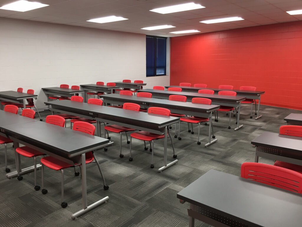 Furniture installation at Jacksonville State University featuring the OM5 Active Guest Chair and Power Lift Lectern.