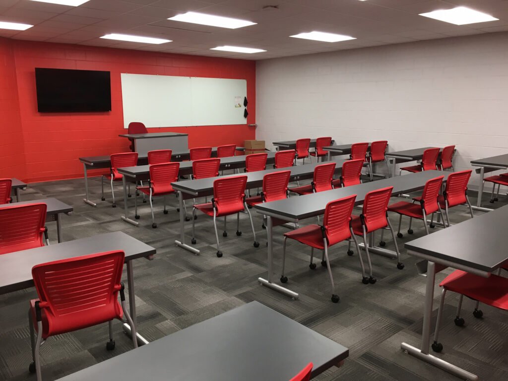 Furniture installation at Jacksonville State University featuring the OM5 Active Guest Chair and Power Lift Lectern.