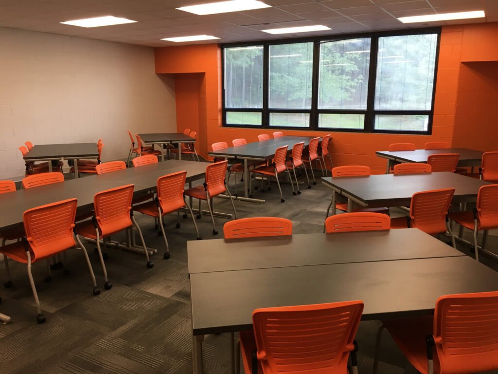 Furniture installation at Jacksonville State University featuring the OM5 Active Guest Chair and Power Lift Lectern.