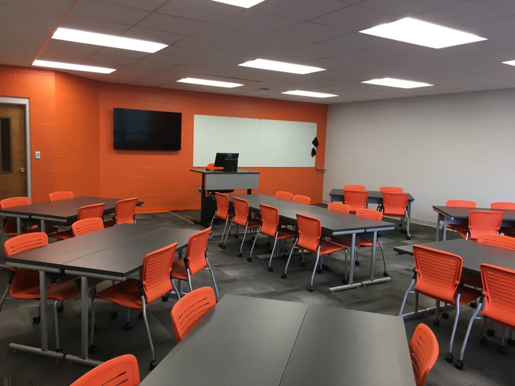 Furniture installation at Jacksonville State University featuring the OM5 Active Guest Chair and Power Lift Lectern.