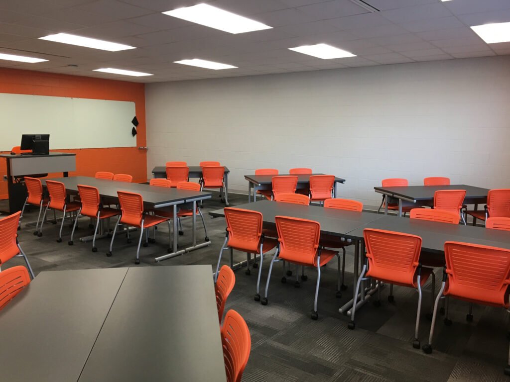 Furniture installation at Jacksonville State University featuring the OM5 Active Guest Chair and Power Lift Lectern.