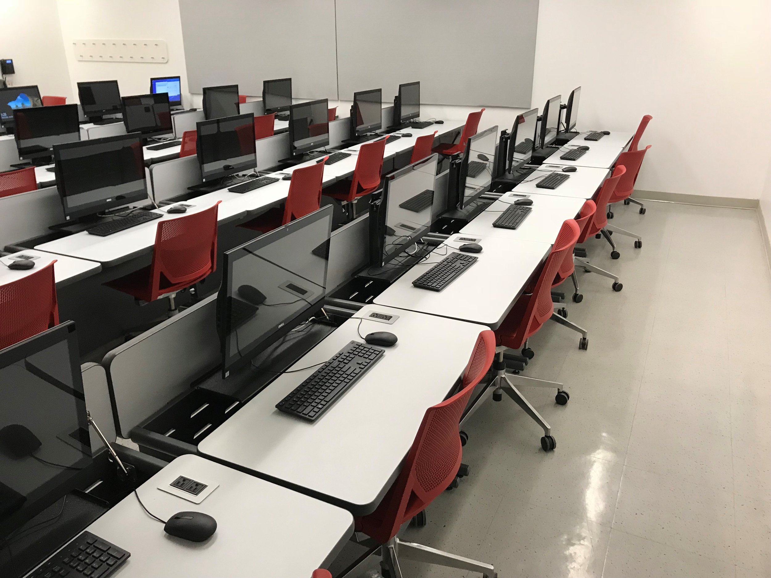 Computer Comforts Hide-Away LCD Tables at Borough of Manhattan Community College