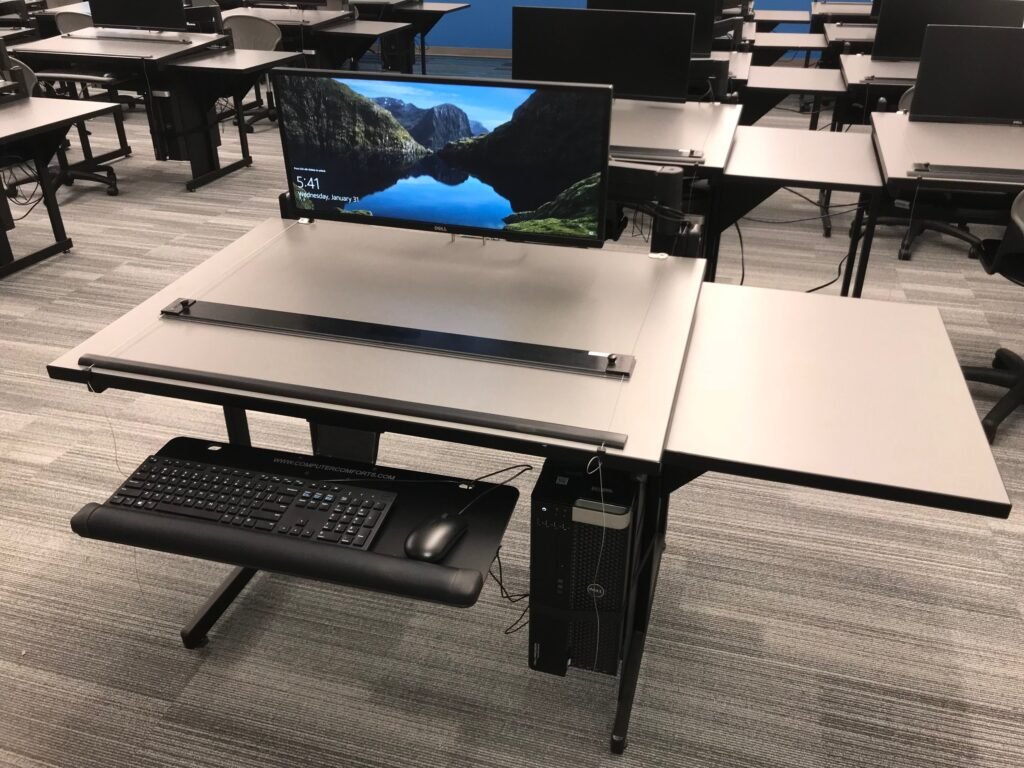 Furniture installation at Lamar State College - Port Arthur featuring the 7000 Articulating Monitor Arm, CAD Drafting Table, RACK2 Fixed CPU Holder and Z-25 Fixed Height Keyboard Platform.