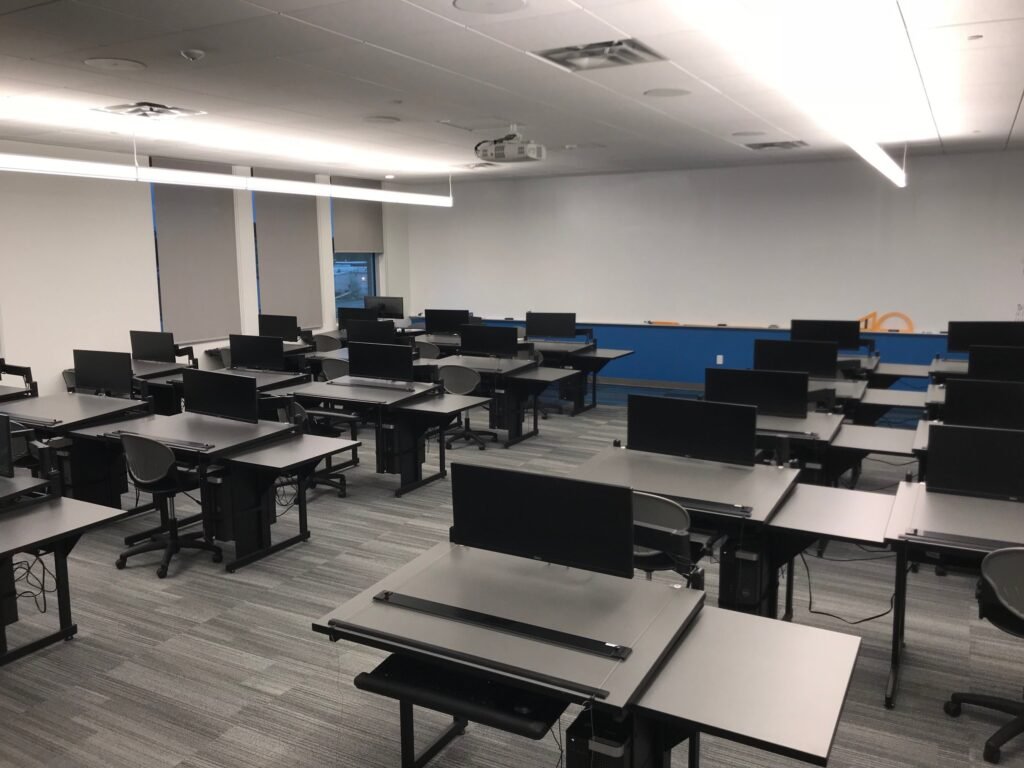 Furniture installation at Lamar State College - Port Arthur featuring the 7000 Articulating Monitor Arm, CAD Drafting Table, RACK2 Fixed CPU Holder and Z-25 Fixed Height Keyboard Platform.