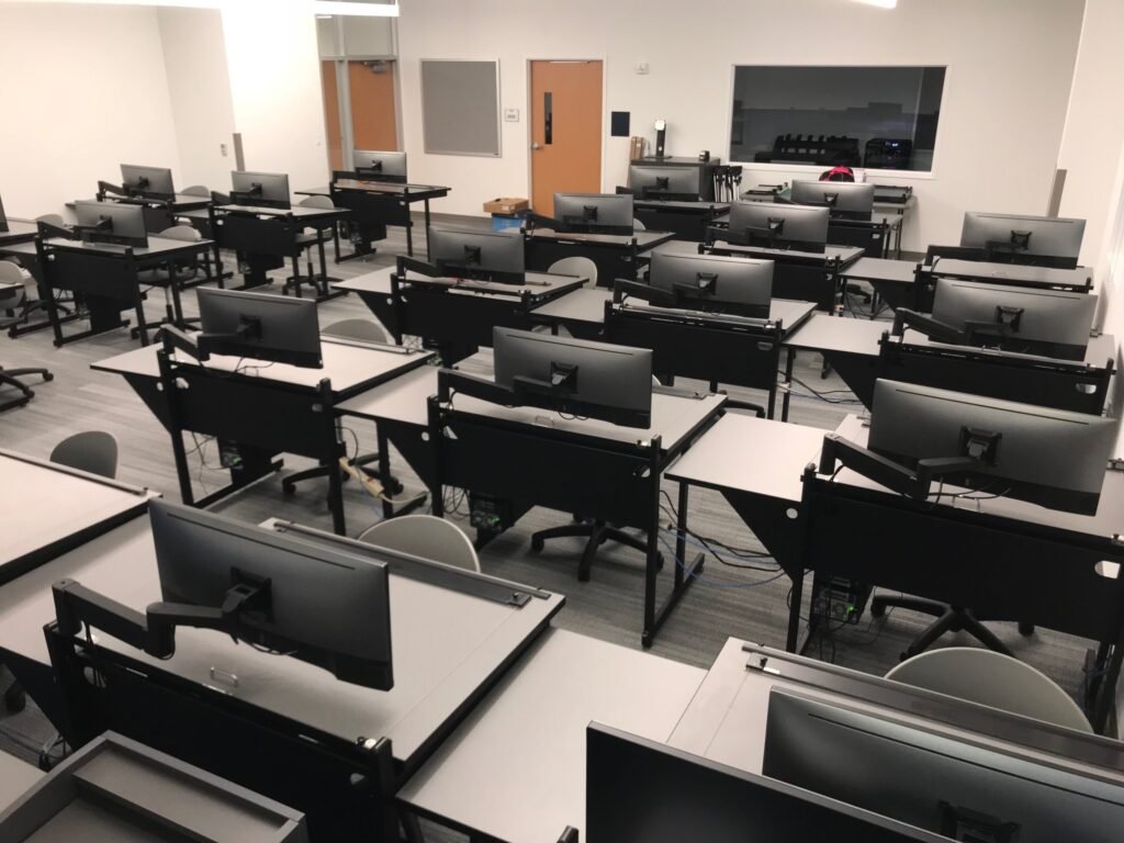 Furniture installation at Lamar State College - Port Arthur featuring the 7000 Articulating Monitor Arm, CAD Drafting Table, RACK2 Fixed CPU Holder and Z-25 Fixed Height Keyboard Platform.