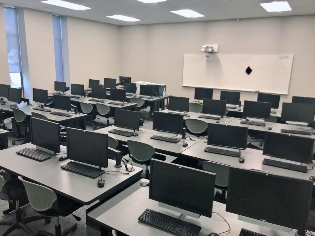 Furniture installation at Lamar State College - Port Arthur featuring the Basic Table, 7000 Articulating Monitor Arm and RACK2 Fixed CPU Holder.