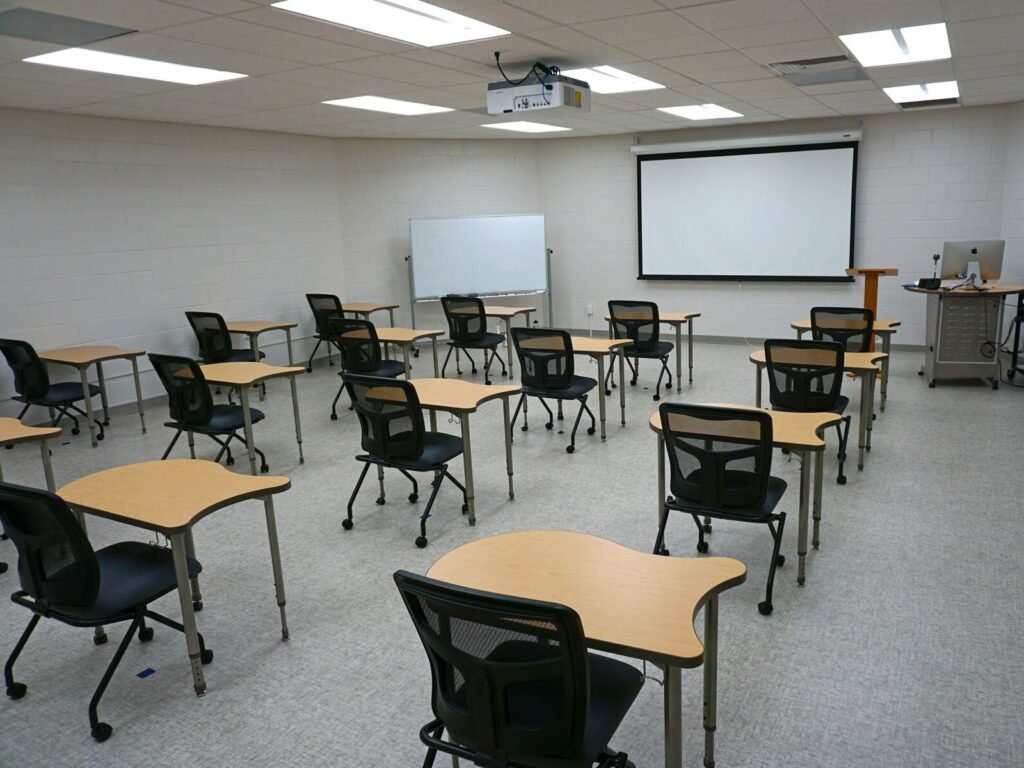 Furniture installation at Saint Mary's College featuring the YS71N Nesting Chair, Koi Table, Universal Lectern 2 and AdapTable Series.
