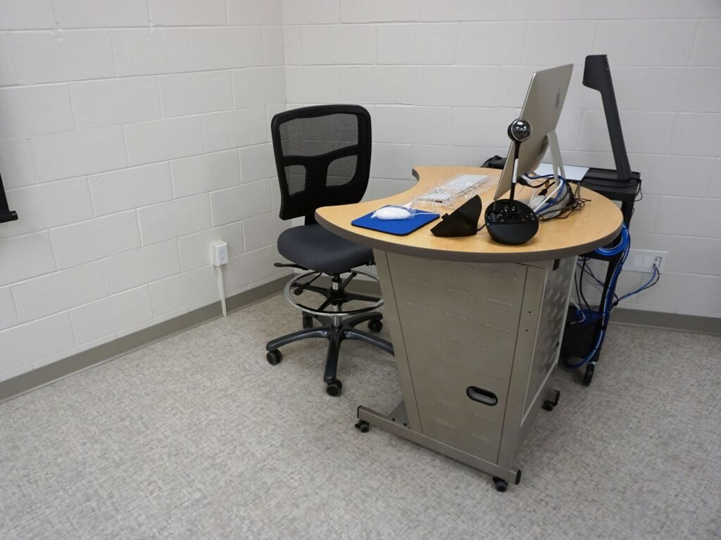 Furniture installation at Saint Mary's College featuring the YS71N Nesting Chair, Koi Table, Universal Lectern 2 and AdapTable Series.
