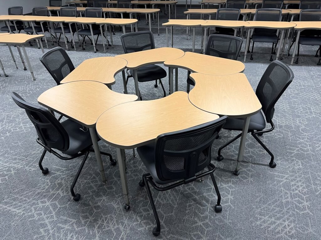 Furniture installation at Saint Mary's College featuring the YS71N Nesting Chair, Koi Table, Universal Lectern 2 and AdapTable Series.