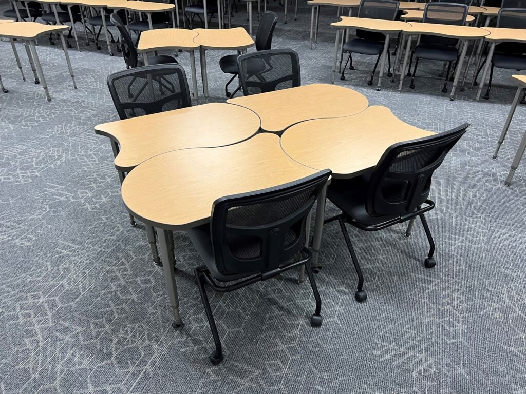 Furniture installation at Saint Mary's College featuring the YS71N Nesting Chair, Koi Table, Universal Lectern 2 and AdapTable Series.