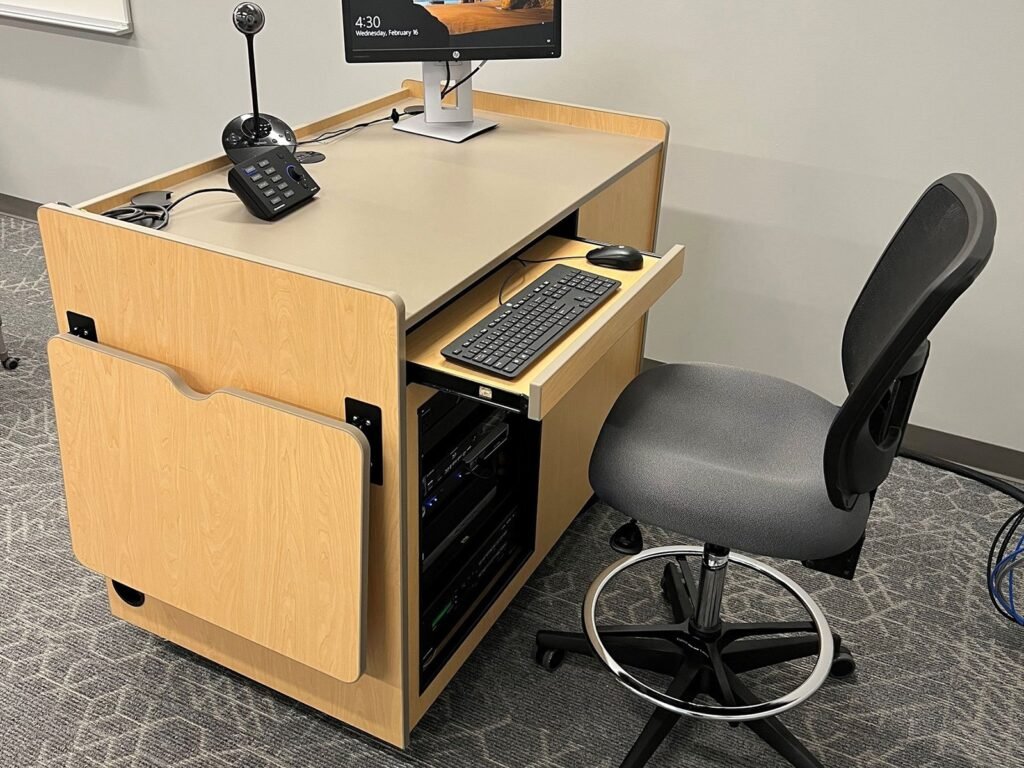 Furniture installation at Saint Mary's College featuring the YS71N Nesting Chair, Koi Table, Universal Lectern 2 and AdapTable Series.