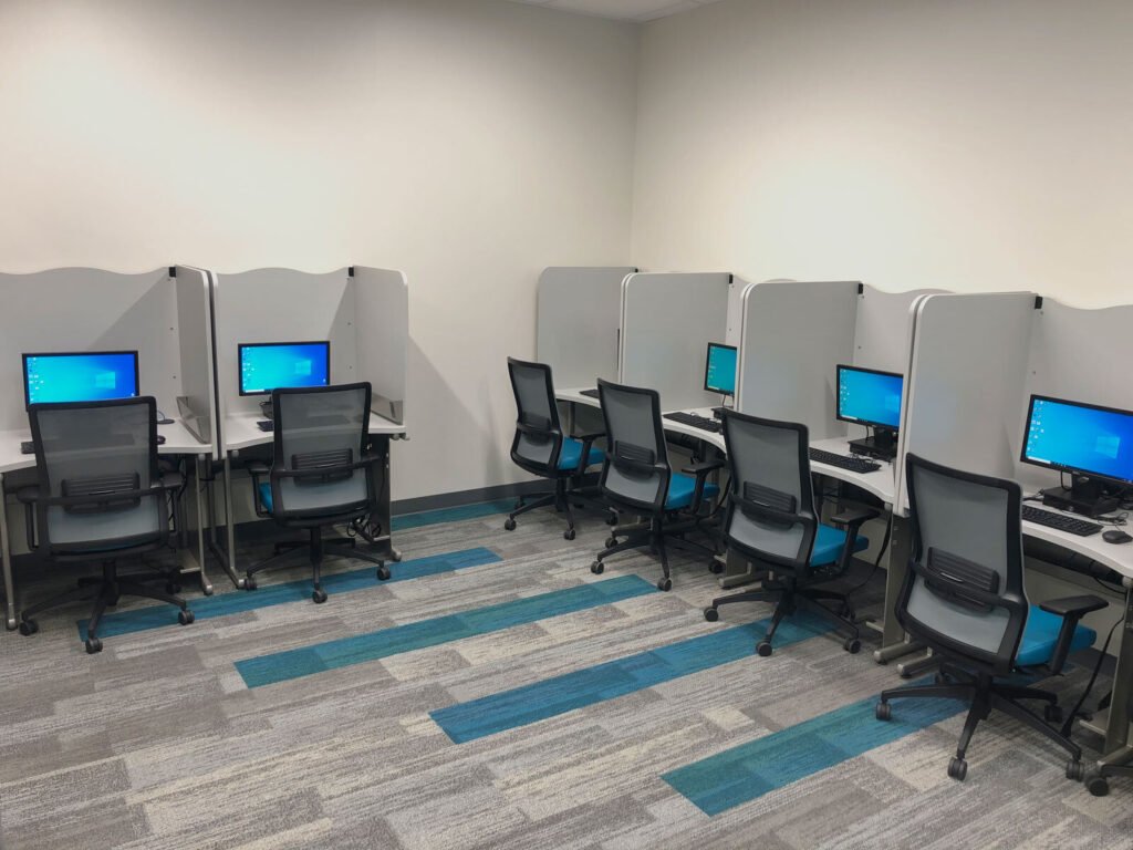Computer Comforts' PV Testing Carrels shown positioned along the testing center perimeter.