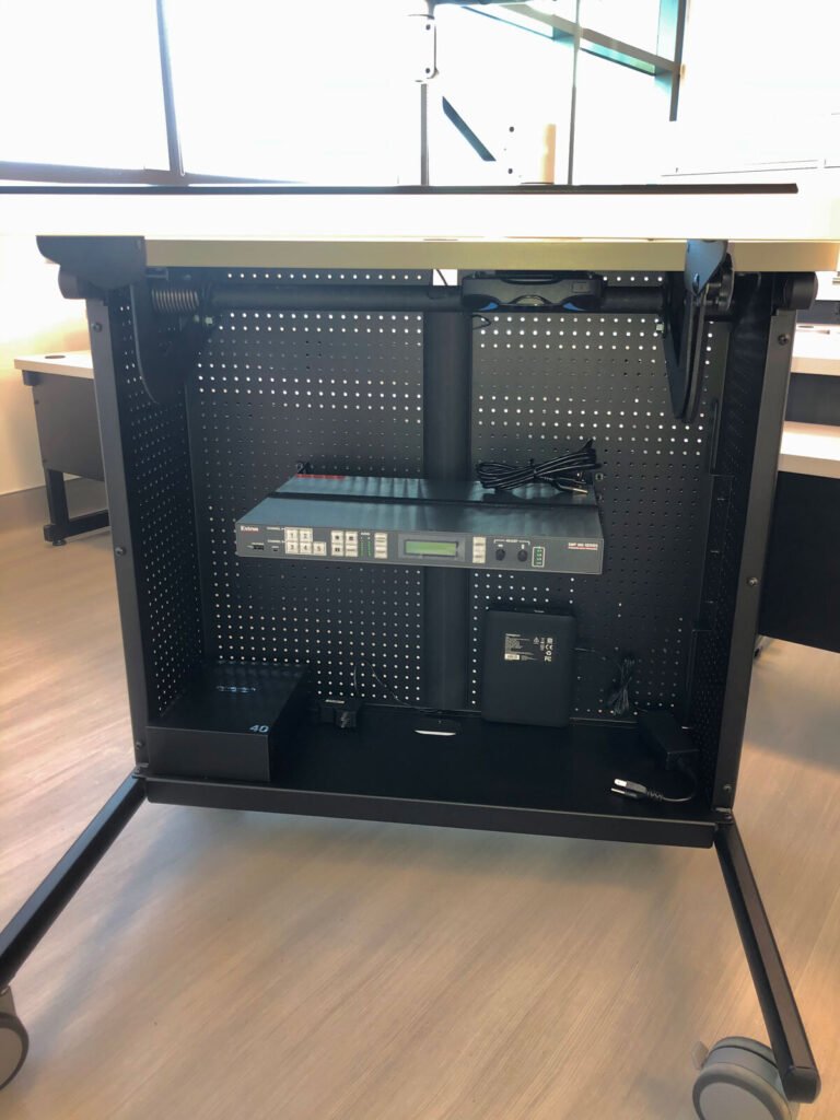 Computer Comforts' Freedom Instructor Cart shown with adjustable shelf and portable battery