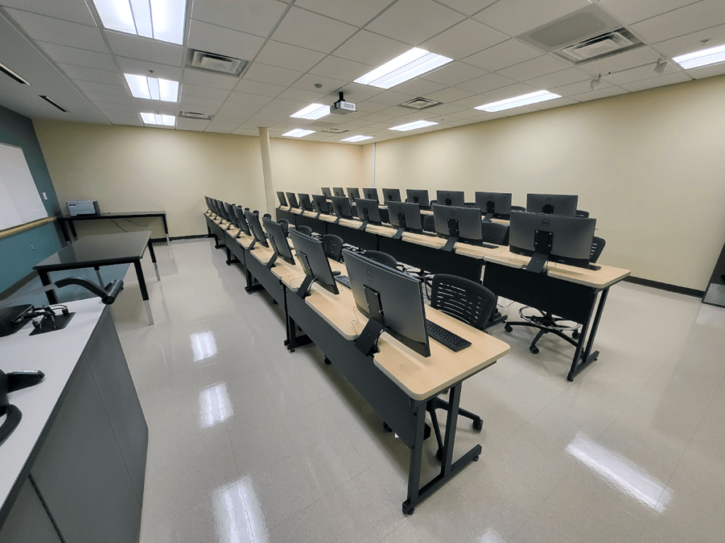 Computer Comforts' Tiered LCD Secure Student Tables (Tier Secure) and OM5 Active Task Stools at Cayuga Community College