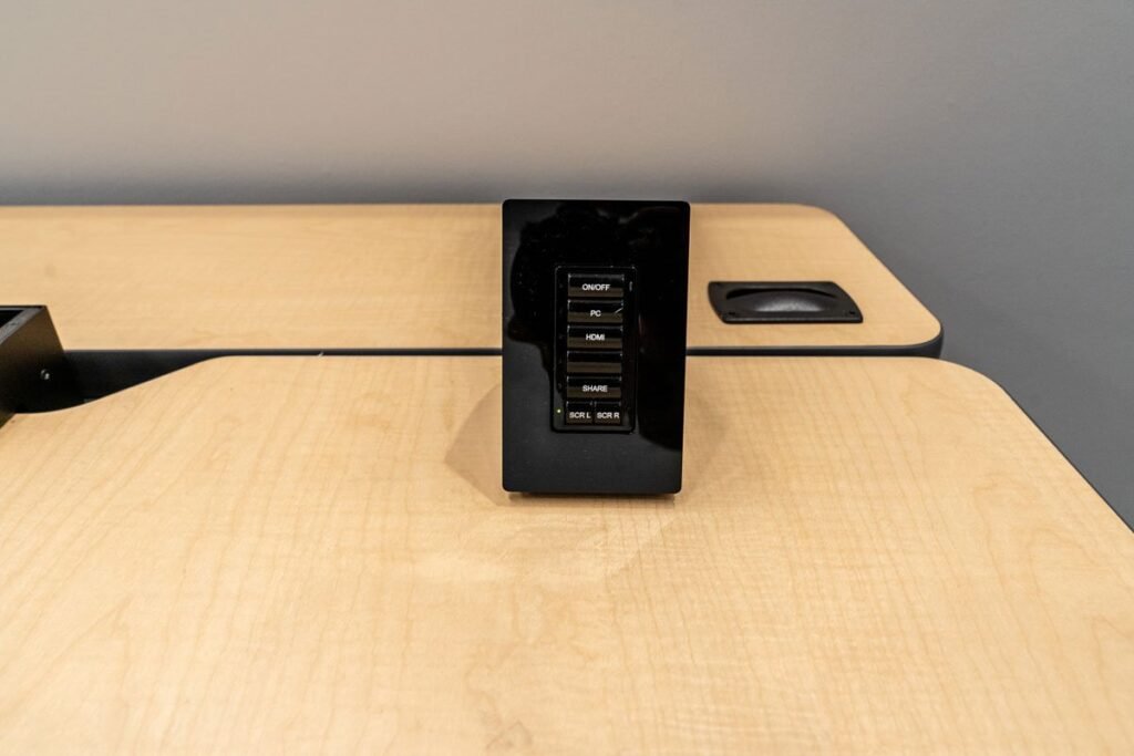 Computer Comforts' Collaborative Student Tables shown with table-top controls.