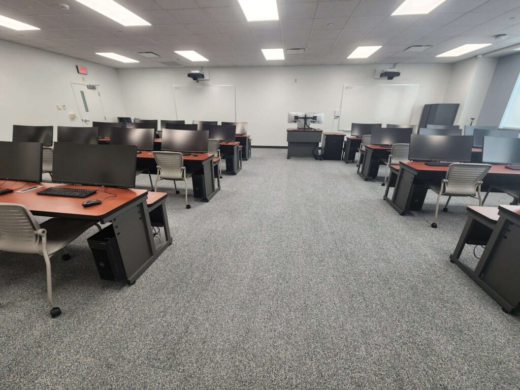 Computer Comforts' Split Level Classroom Tables and Adjustable Height Lectern at Rochester Institute of Technology