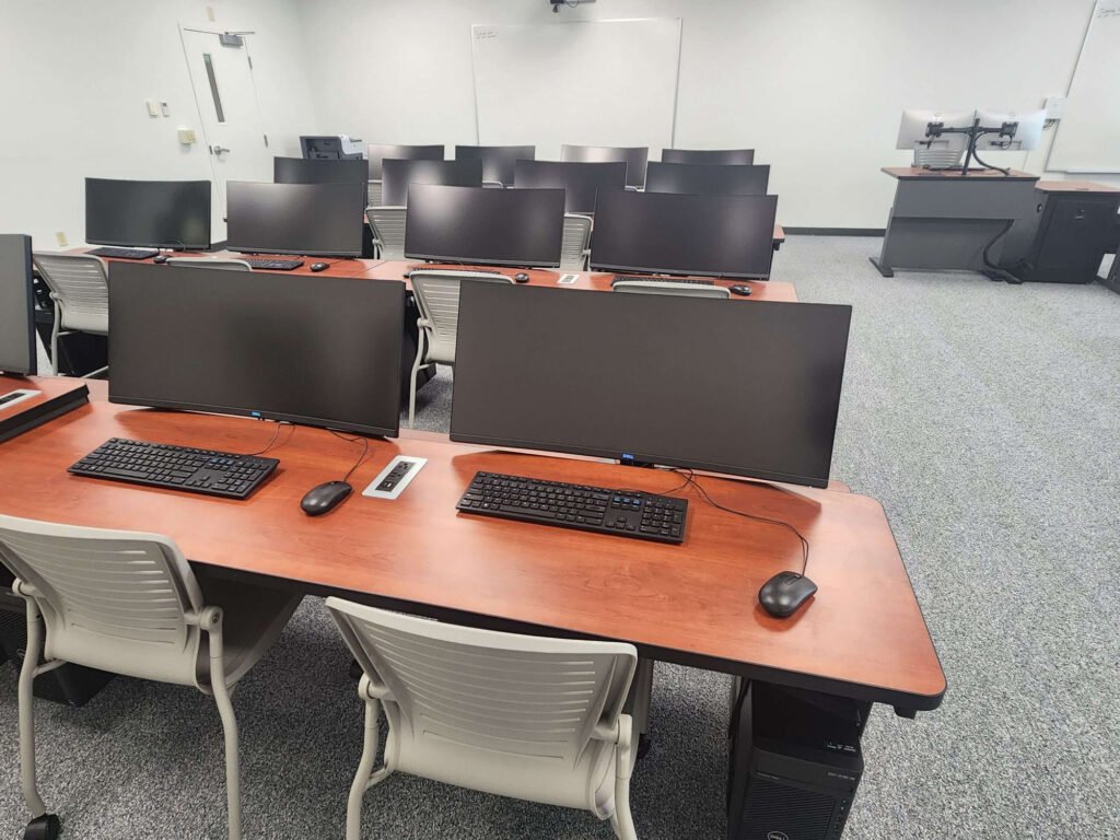 Computer Comforts' Split Level Classroom Tables at Rochester Institute of Technology shown with a CPU Holder and Power Interface