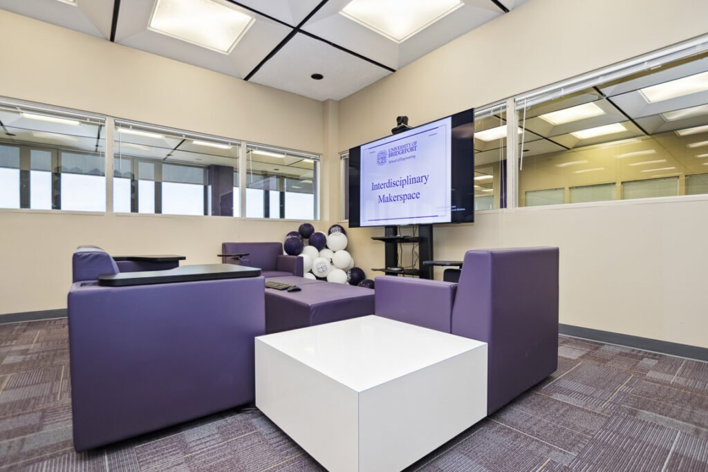 Furniture installation at University of Bridgeport featuring the OM5 Active Task Chair, Active Learning Cluster, Axil Z, PowerBar, Collaborative Table Series and Coligo Acoustic Panels.