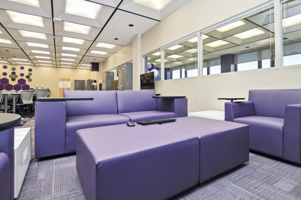 Furniture installation at University of Bridgeport featuring the OM5 Active Task Chair, Active Learning Cluster, Axil Z, PowerBar, Collaborative Table Series and Coligo Acoustic Panels.