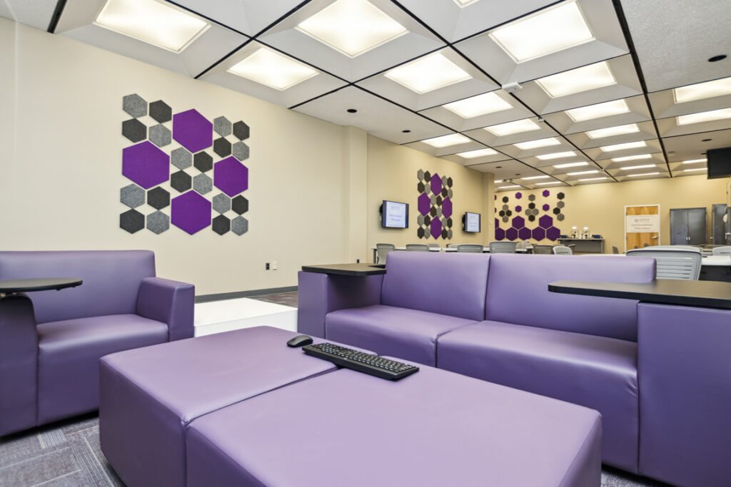 Furniture installation at University of Bridgeport featuring the OM5 Active Task Chair, Active Learning Cluster, Axil Z, PowerBar, Collaborative Table Series and Coligo Acoustic Panels.