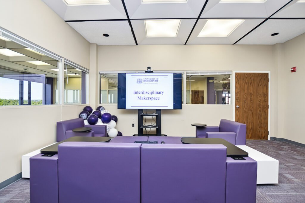 Furniture installation at University of Bridgeport featuring the OM5 Active Task Chair, Active Learning Cluster, Axil Z, PowerBar, Collaborative Table Series and Coligo Acoustic Panels.