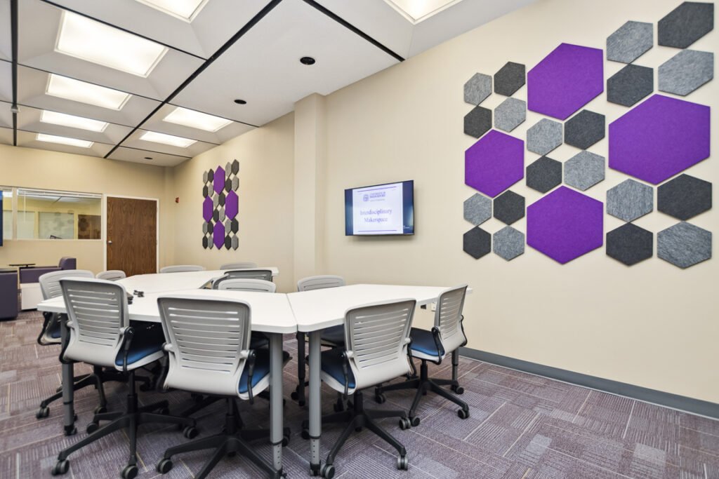 Furniture installation at University of Bridgeport featuring the OM5 Active Task Chair, Active Learning Cluster, Axil Z, PowerBar, Collaborative Table Series and Coligo Acoustic Panels.