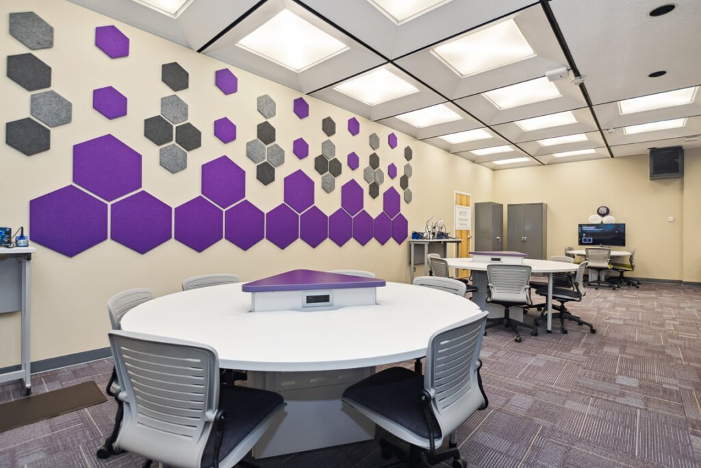 Furniture installation at University of Bridgeport featuring the OM5 Active Task Chair, Active Learning Cluster, Axil Z, PowerBar, Collaborative Table Series and Coligo Acoustic Panels.