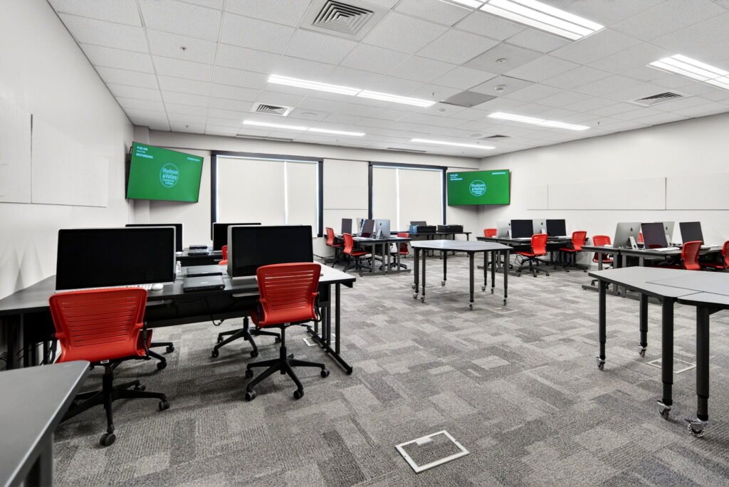 Furniture installation at Hudson Valley Community College featuring the AdapTable Series, Recessed LCD Table, OM5 Active Task Chair, OM5 Active Task Stool and EVOLVE Lectern.