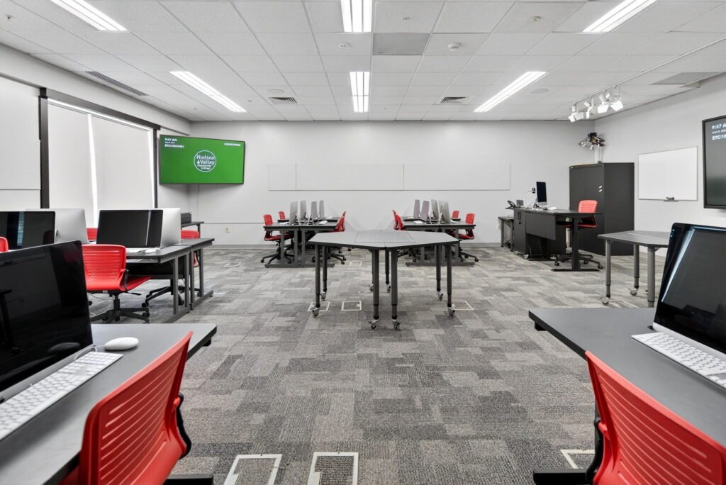 Furniture installation at Hudson Valley Community College featuring the AdapTable Series, Recessed LCD Table, OM5 Active Task Chair, OM5 Active Task Stool and EVOLVE Lectern.