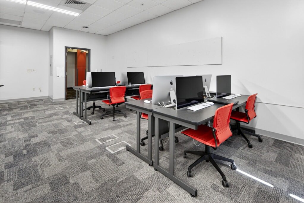 Furniture installation at Hudson Valley Community College featuring the AdapTable Series, Recessed LCD Table, OM5 Active Task Chair, OM5 Active Task Stool and EVOLVE Lectern.