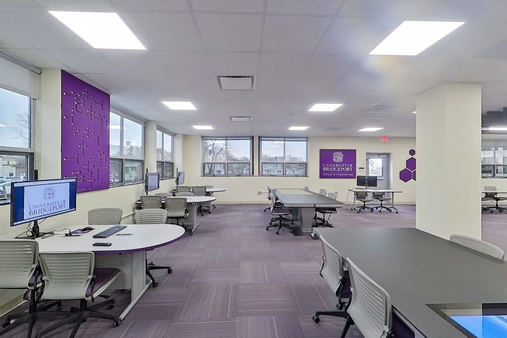 Furniture installation at University of Bridgeport featuring the Coligo Acoustic Panels, Collaborative Table Series, AdapTable Series, Addo Acoustic Panels and OM5 Active Task Chair.