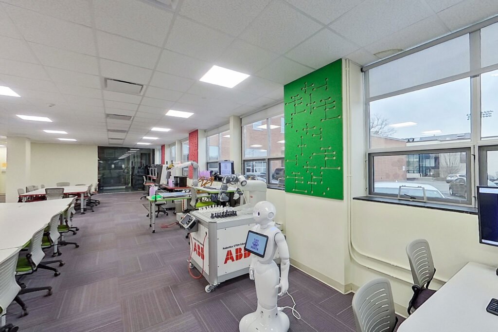 Furniture installation at University of Bridgeport featuring the Coligo Acoustic Panels, Collaborative Table Series, AdapTable Series, Addo Acoustic Panels and OM5 Active Task Chair.