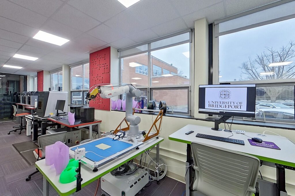 Furniture installation at University of Bridgeport featuring the Coligo Acoustic Panels, Collaborative Table Series, AdapTable Series, Addo Acoustic Panels and OM5 Active Task Chair.