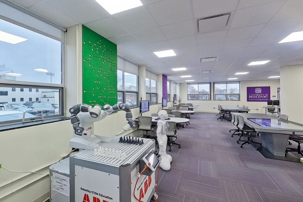 Furniture installation at University of Bridgeport featuring the Coligo Acoustic Panels, Collaborative Table Series, AdapTable Series, Addo Acoustic Panels and OM5 Active Task Chair.
