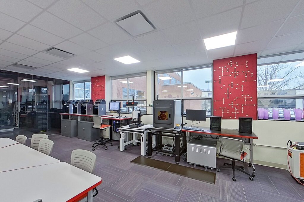 Furniture installation at University of Bridgeport featuring the Coligo Acoustic Panels, Collaborative Table Series, AdapTable Series, Addo Acoustic Panels and OM5 Active Task Chair.
