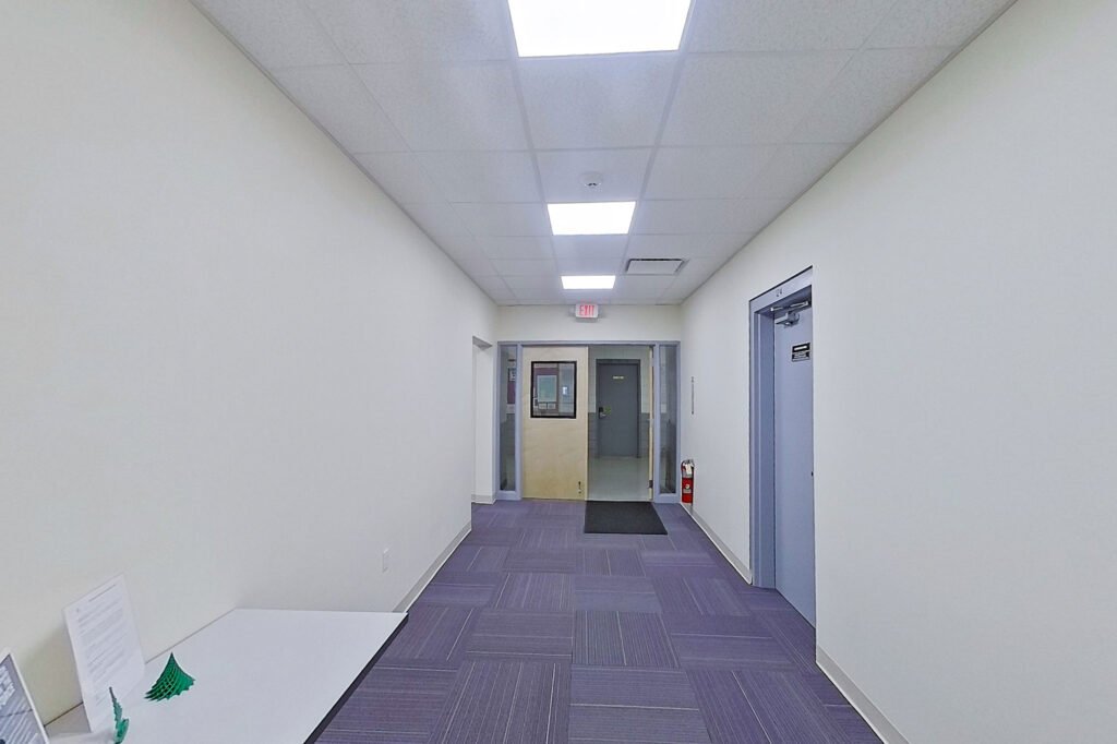 Furniture installation at University of Bridgeport featuring the Coligo Acoustic Panels, Collaborative Table Series, AdapTable Series, Addo Acoustic Panels and OM5 Active Task Chair.