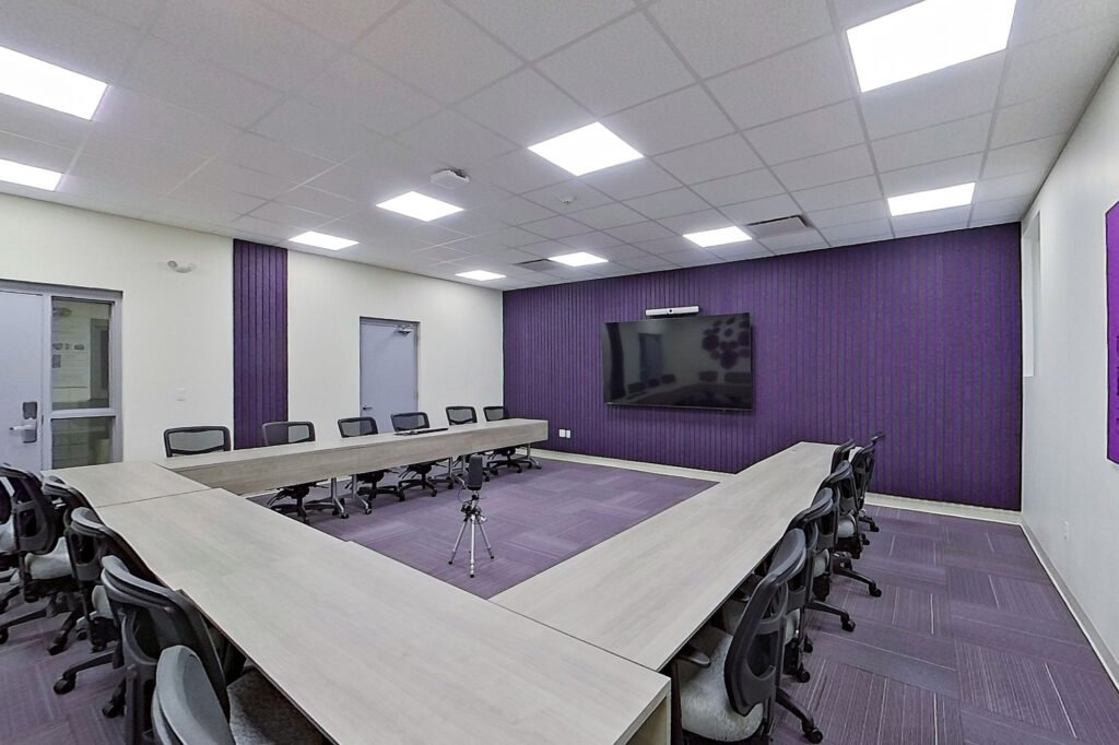 Furniture installation at University of Bridgeport featuring the Coligo Acoustic Panels, Collaborative Table Series, AdapTable Series, Addo Acoustic Panels and OM5 Active Task Chair.