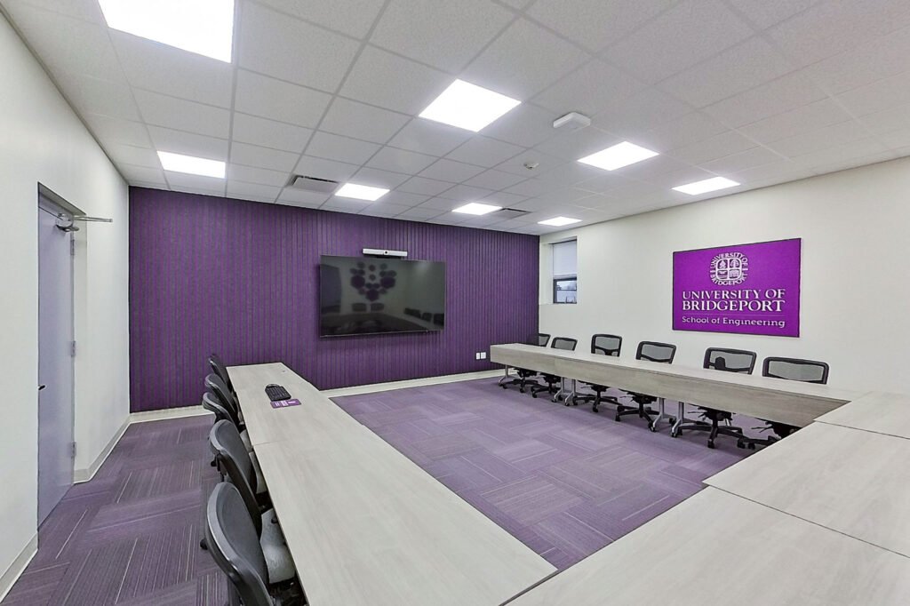 Furniture installation at University of Bridgeport featuring the Coligo Acoustic Panels, Collaborative Table Series, AdapTable Series, Addo Acoustic Panels and OM5 Active Task Chair.