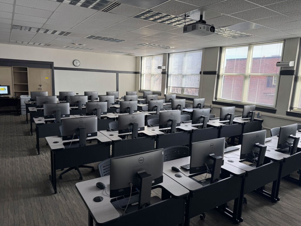 Furniture installation at UNC Greensboro featuring the OM5 Active Task Chair, Node and Recessed LCD Table.