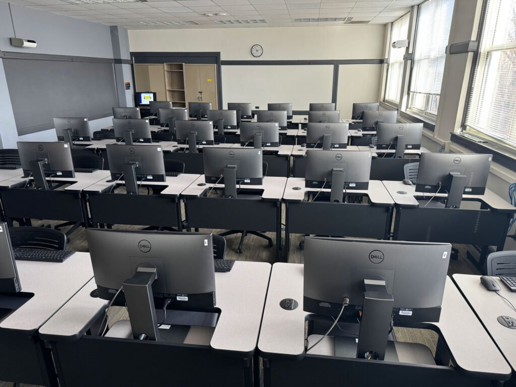 Furniture installation at UNC Greensboro featuring the OM5 Active Task Chair, Node and Recessed LCD Table.